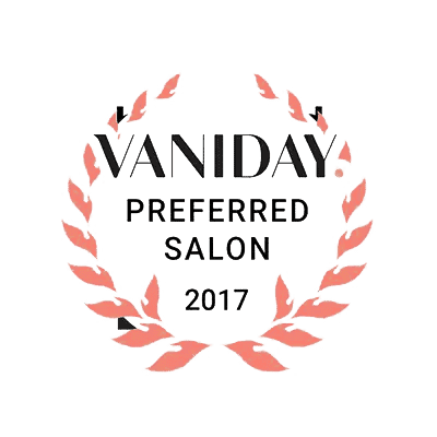Elegant salon award badge with laurel wreath and VANIDAY Preferred Salon 2017 text.